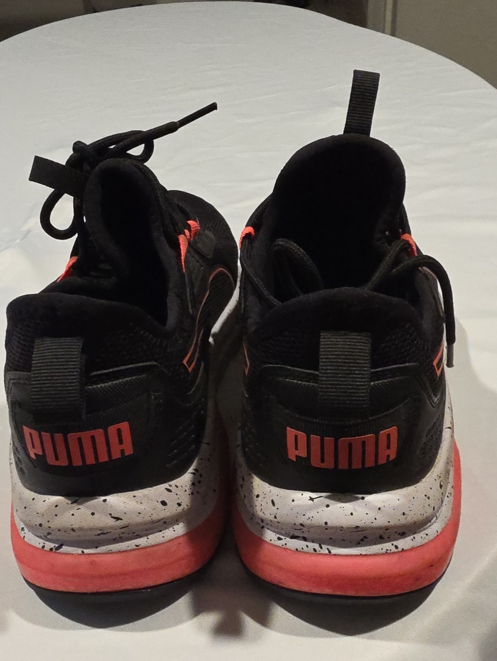 Puma Kids Black Sneakers with Coral Accents